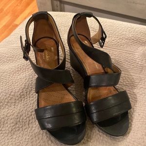 Clarks black artisan.  Super cute casual or dressy.